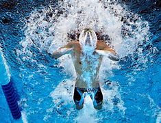 Image result for Competitive Swimming Brown Kids