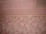 Image result for Pink Grout Gray Tile Bathroom