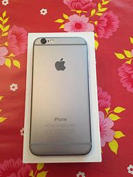 Image result for Verizon iPhone 6s Space Grey in Hand