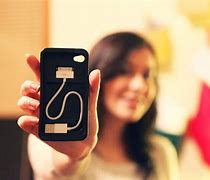 Image result for iPhone Charger Cord On the Table