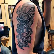 Image result for robotic arms tattoos