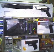 Image result for Toy Gun Shop