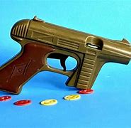 Image result for Toy Guns From the 60s