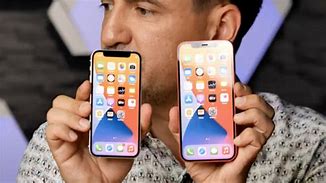 Image result for iPhone Mini in 7In Hand