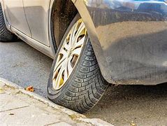 Image result for Car with Broken Wheel
