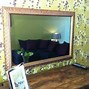 Image result for Flat Screen TV That Turns into a Mirror
