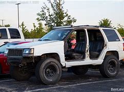 Image result for Jeep Cherokee Lifted Doors Off