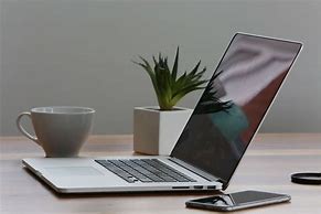 Image result for iPad/iPhone Laptop Computers