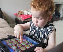Image result for Playing iPad