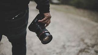 Image result for Photographer Caméra