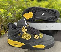 Image result for Air Jordan 4 Black and Yellow