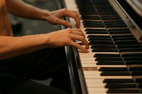 Image result for Playing Piano Stock-Photo
