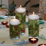 Image result for White Floating Candle Centerpieces Christmas