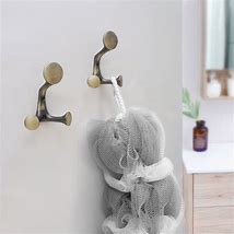 Image result for Stone and Brushed Gold Coat Hooks
