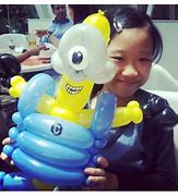Image result for Minion Holding Balloons