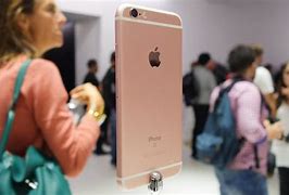 Image result for iPhone 6s Gold in Hand