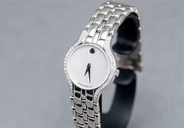 Image result for Movado Watch Gold White