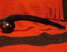 Image result for War Club with Shell Inlay