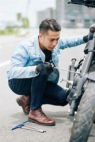 Image result for A Man with Broken Motorcycle