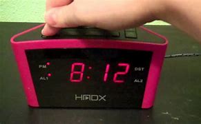 Image result for How to Put a Alarm On Your Clock Vedios