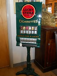 Image result for Antique Cigarette Machine