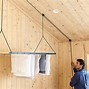 Image result for Hanging Clothes Rack From Ceiling