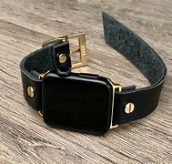 Image result for Black Apple Watch with Gold Band Women