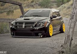 Image result for Yellow Dodge Caliber