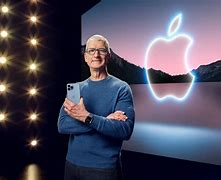 Image result for Tim Cook Shows Off iPhone