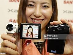 Image result for Sanyo Xacti Dual Camera