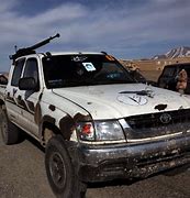 Image result for Toyota Hilux War