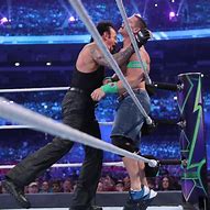 Image result for WWE Wrestlemania 34 Undertaker vs John Cena