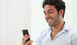 Image result for Happy Person Looking at Phone