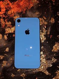 Image result for iPhone XR Blue with Hand Held