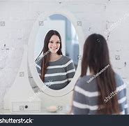 Image result for Person Looking at Reflection in Mirror