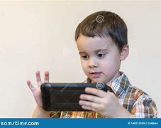 Image result for Boy Holding Phone