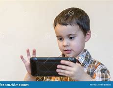 Image result for Boy with Cell Phone Tommy