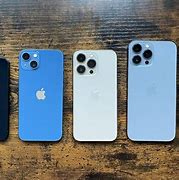 Image result for Black iPhone 13 in Blue Case