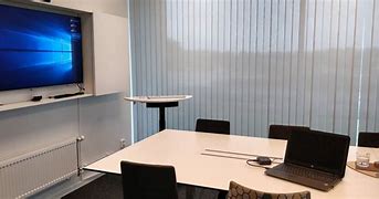 Image result for Picture of a Meeting in Cable and Wireless