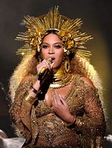 Image result for Beyoncé Gold Dress