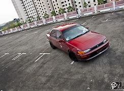 Image result for Black and Red Wrapped Corolla XSE