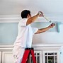 Image result for Person Painting Wall