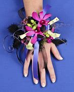 Image result for Black Flowers with Gold Ribbon Corsage
