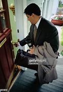 Image result for Man Unlocking Front Door