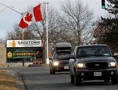 Image result for CFB Gagetown Run with Olympic Torch