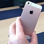 Image result for hands in mac iphone se photo