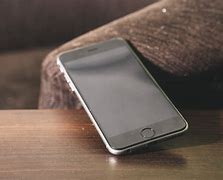 Image result for iPhone 12 Purple On Table Banner