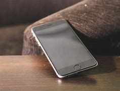 Image result for Mobile Phone On the Table
