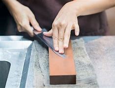 Image result for Sharpening a Knife with a Stone