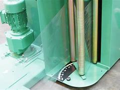 Image result for Tape and Reel Machine